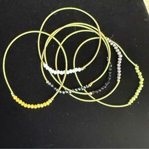 Set of 6 guitar string bracelets with crystal beads